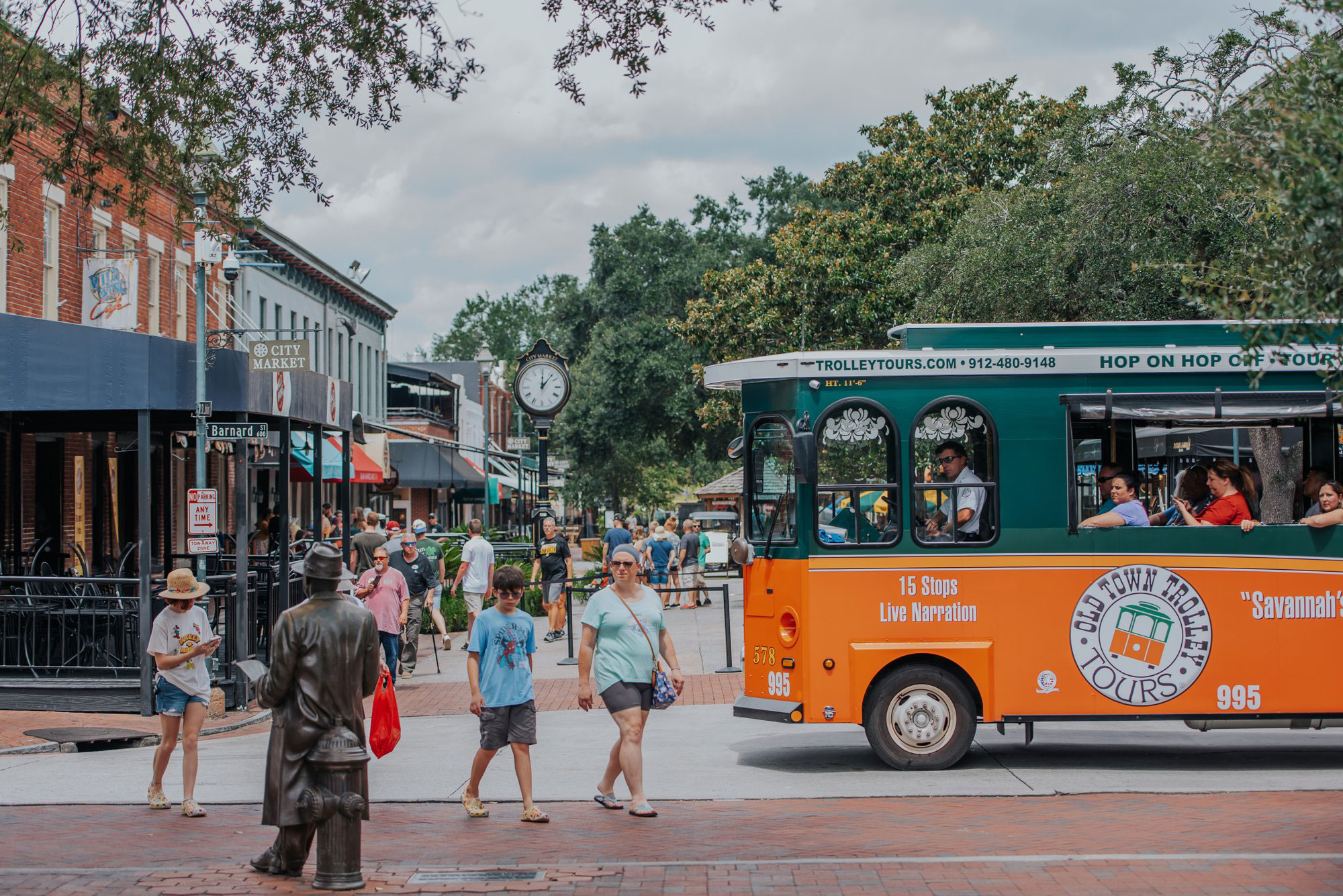 Old Town Trolley and Johnny Mercer statue in Savannah's City Market