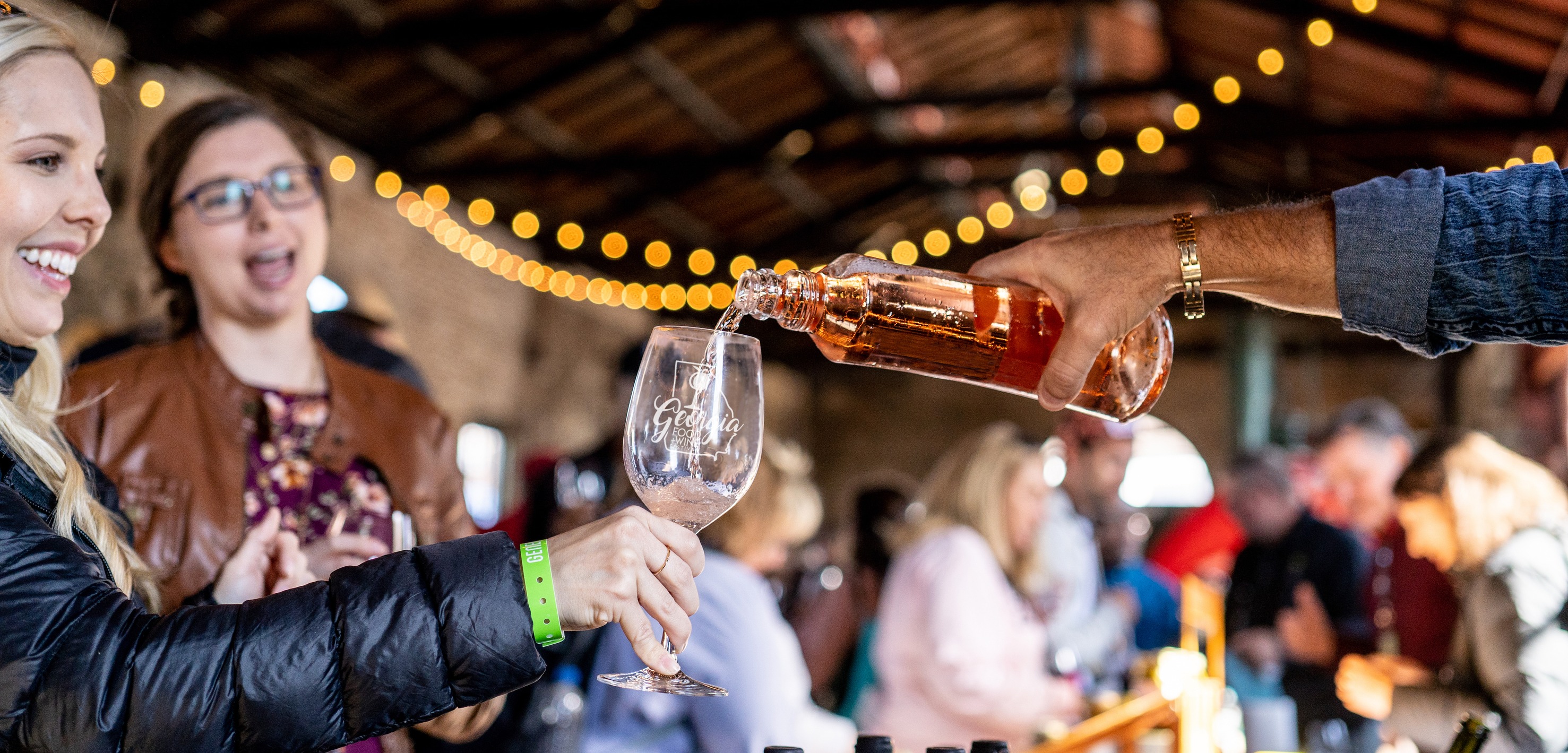 Pouring wine at Georgia Food + Wine Festival in Marietta, Georgia