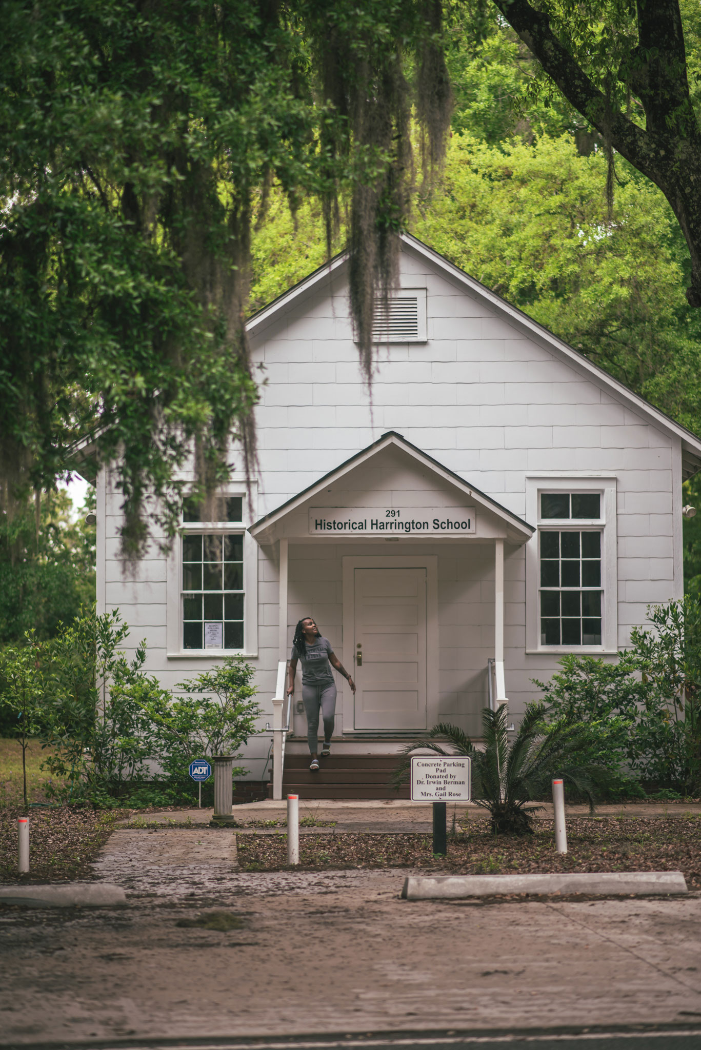 Woman outside The Harrington School on St. Simons Island, Georgia