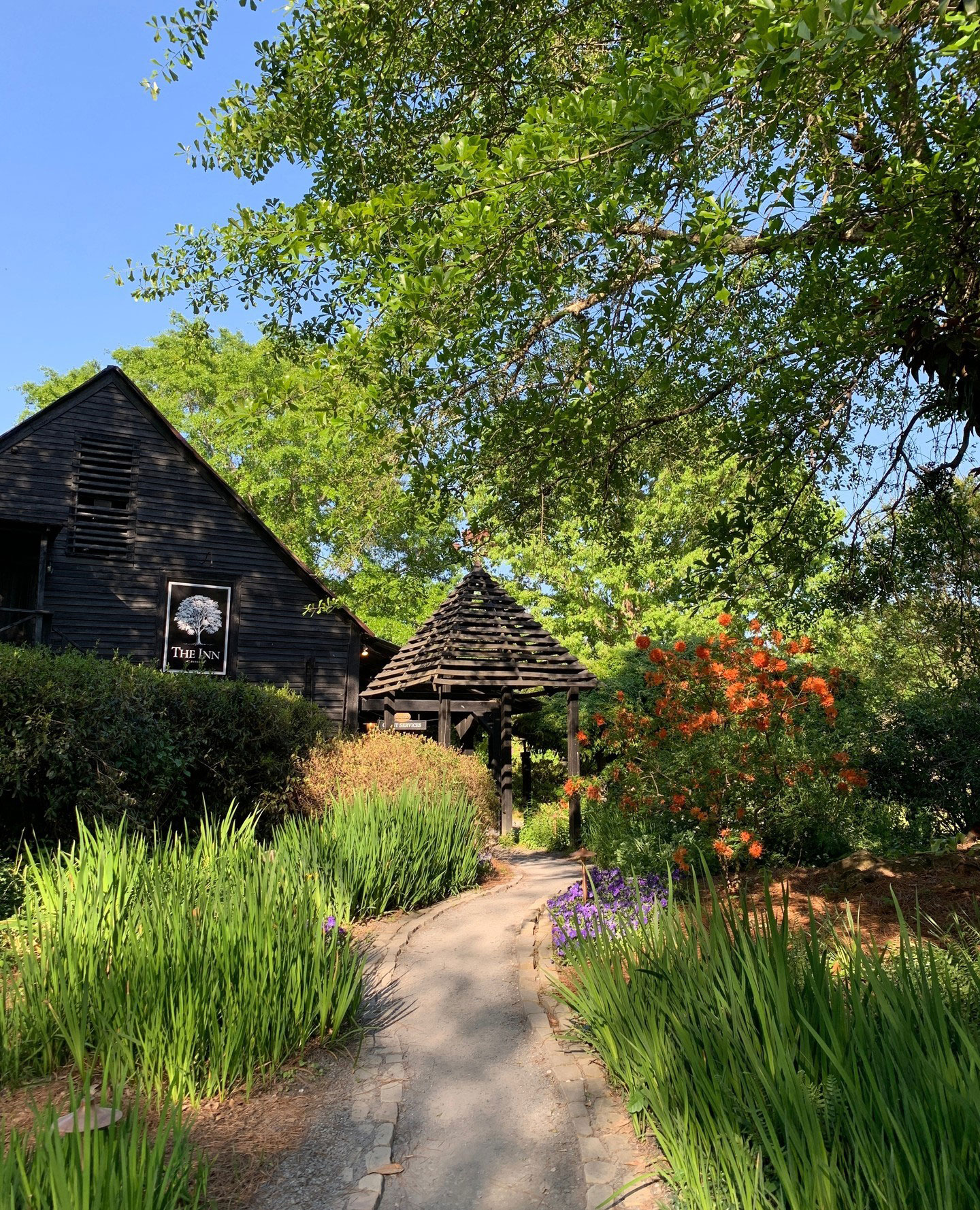 Exterior and gardens at The Inn at Serenbe in Chattahoochee Hills, Georgia. Photo by @innatserenbe