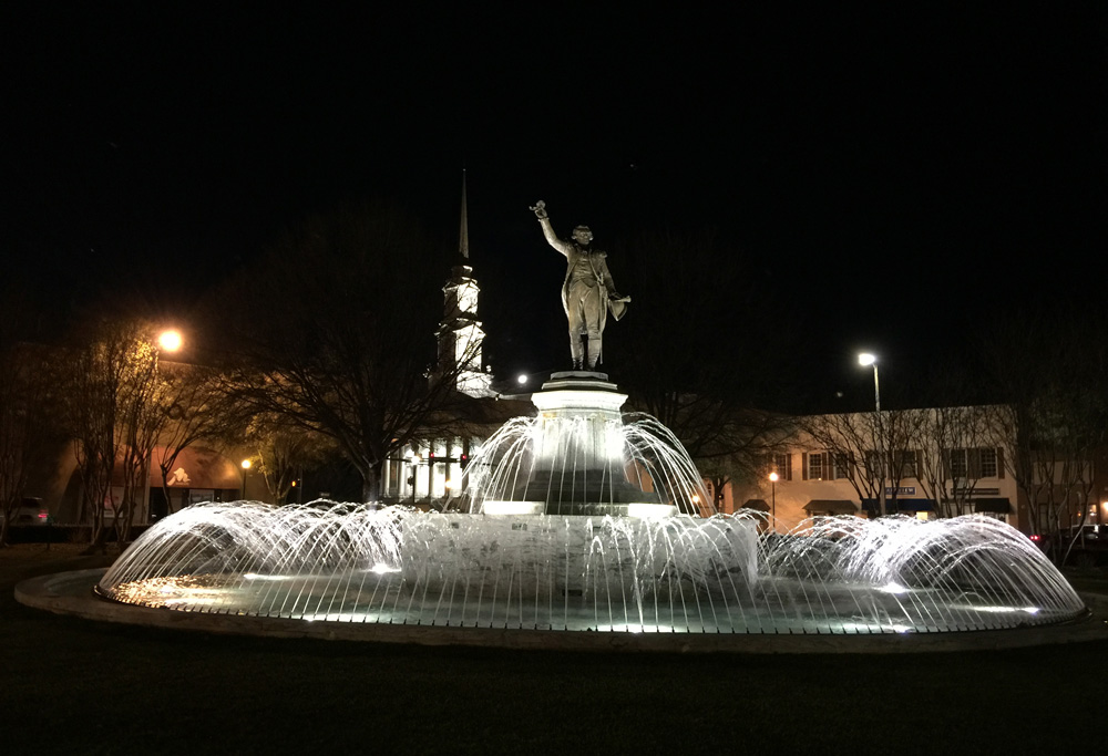 A bronze statue of General Lafayette stands in the center of the downtown LaGrange.