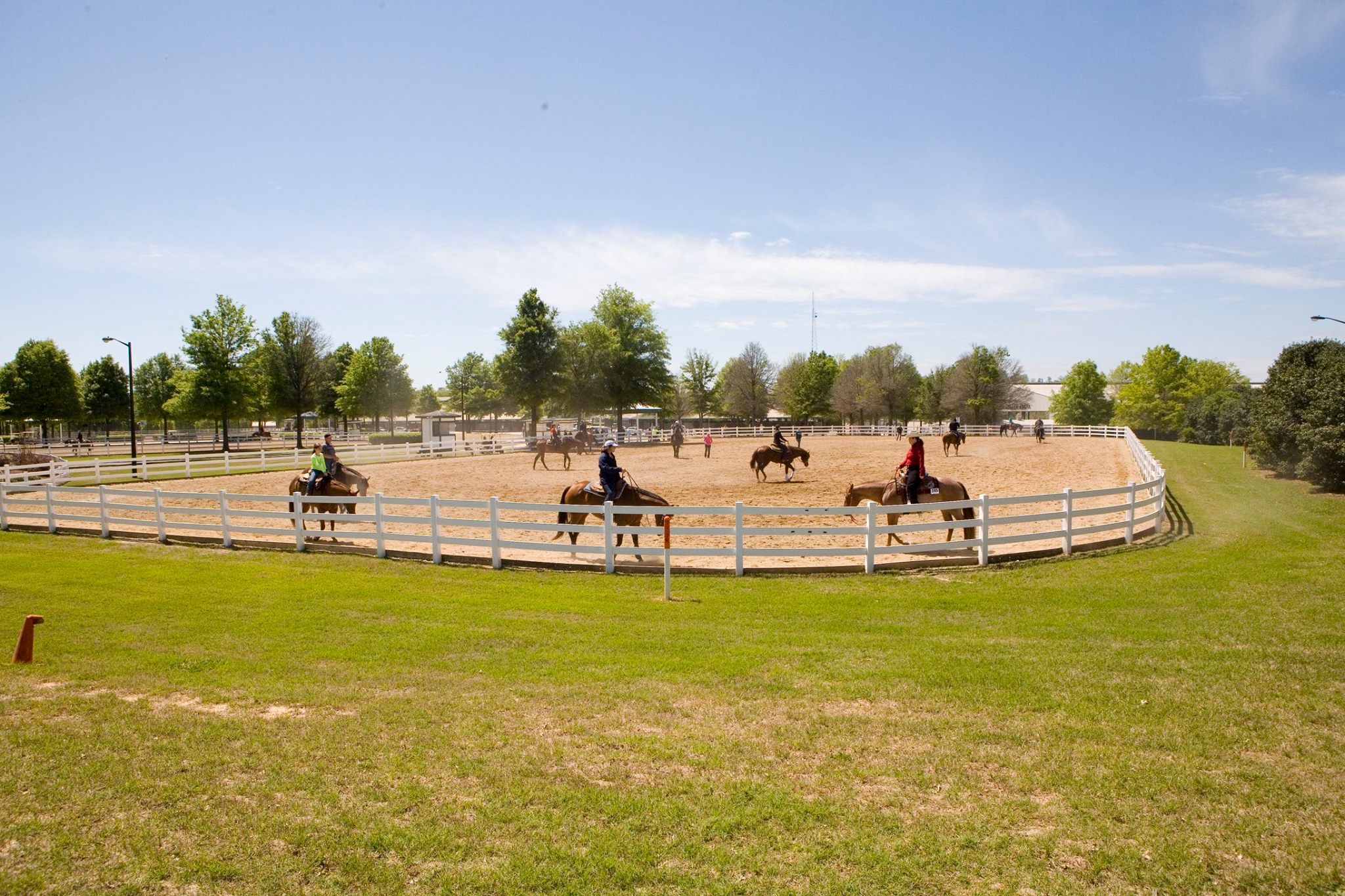 Riders and horses in a ring at the Georgia International Horse Park