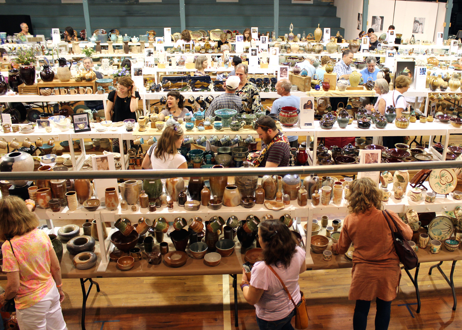 Rows of pottery on display at Perspectives in Watkinsville, Georgia