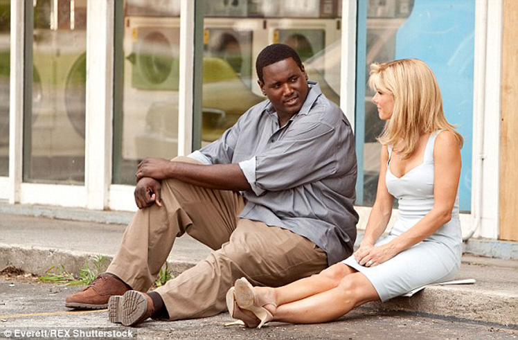 Qunton Aaron and Sandra Bullock in The Blind Side