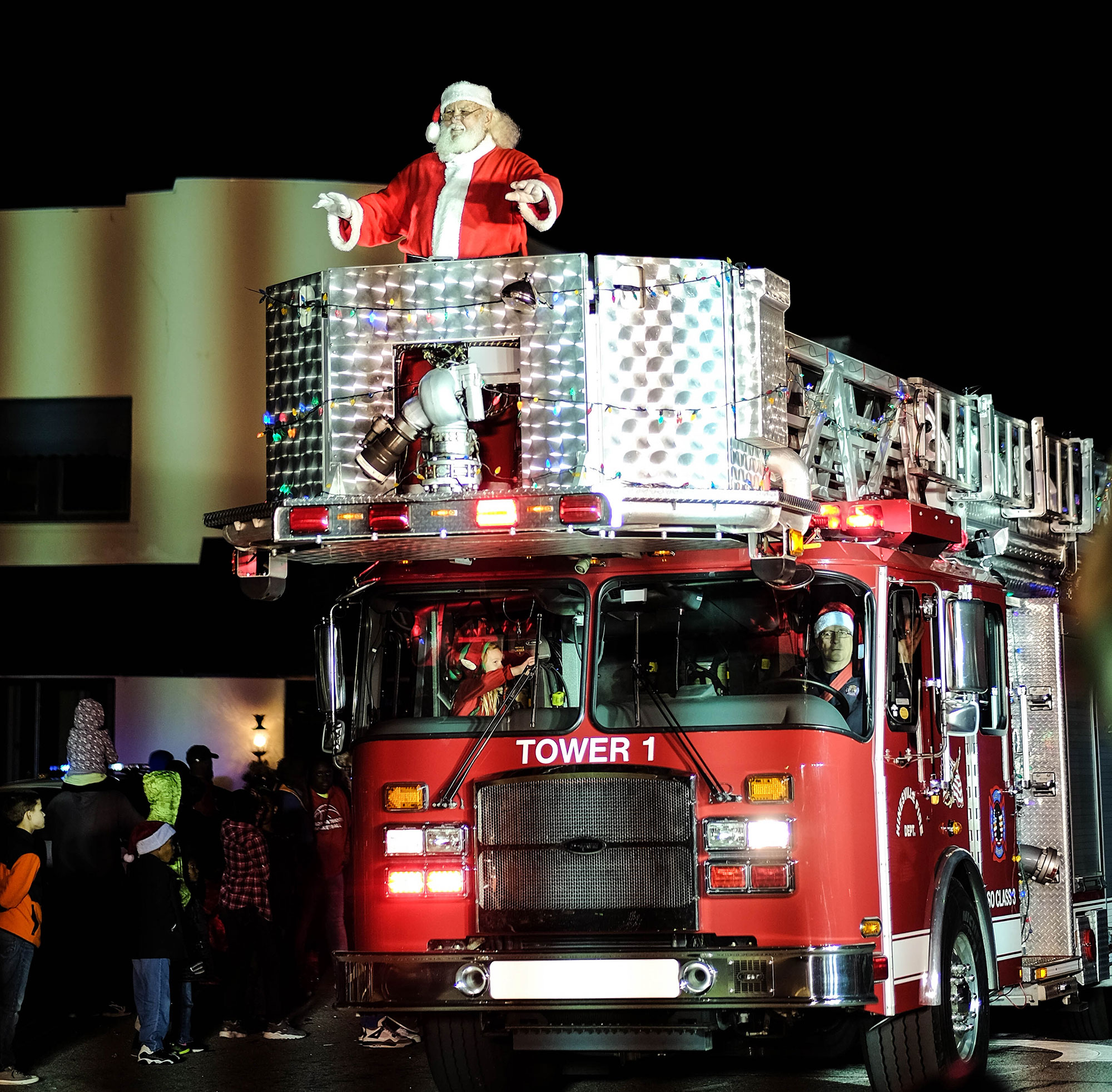Santa on a firetruck at the Liberty County Illuminated Christmas Parade in Hinesville, Georgia