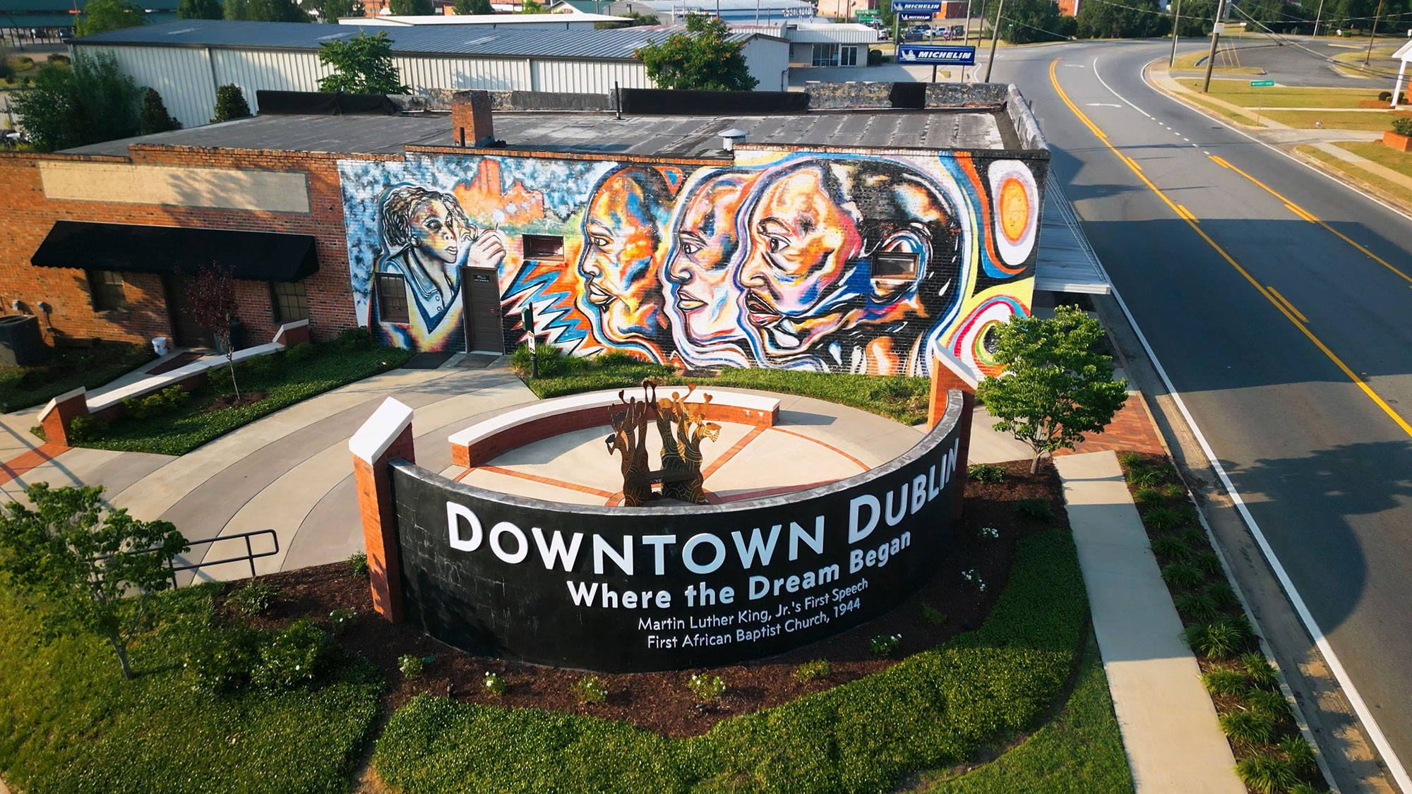 Bird's eye view of the colorful mural and sculpture at MLK Monument Park in Dublin, Georgia