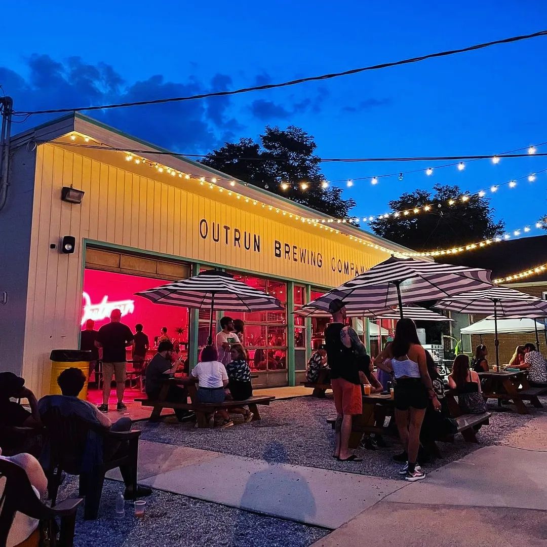 People in outdoor courtyard at Outrun Brewing Company in Stone Mountain, Georgia