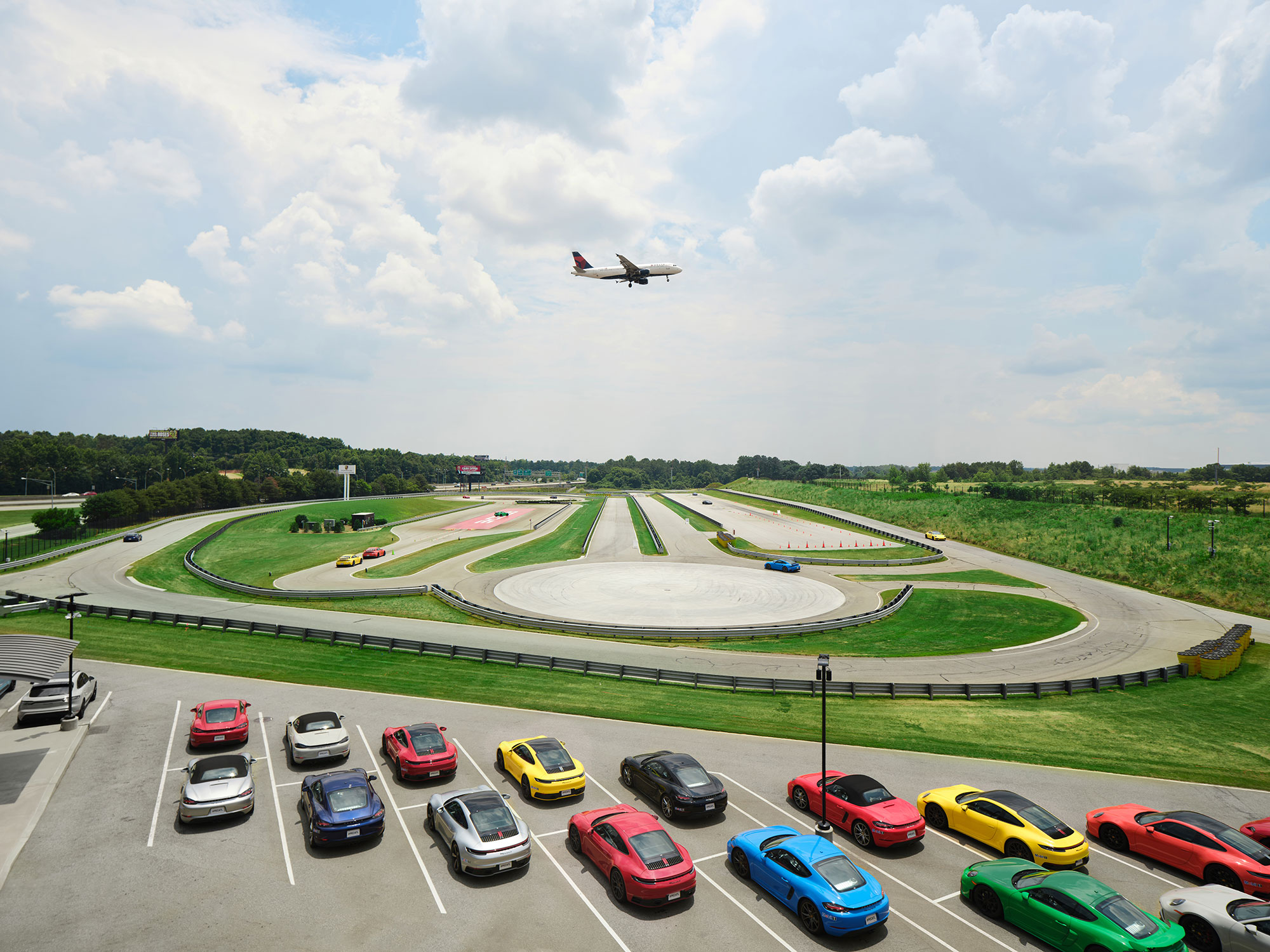 Plane flying over Porsche Experience Center in Atlanta, Georgia