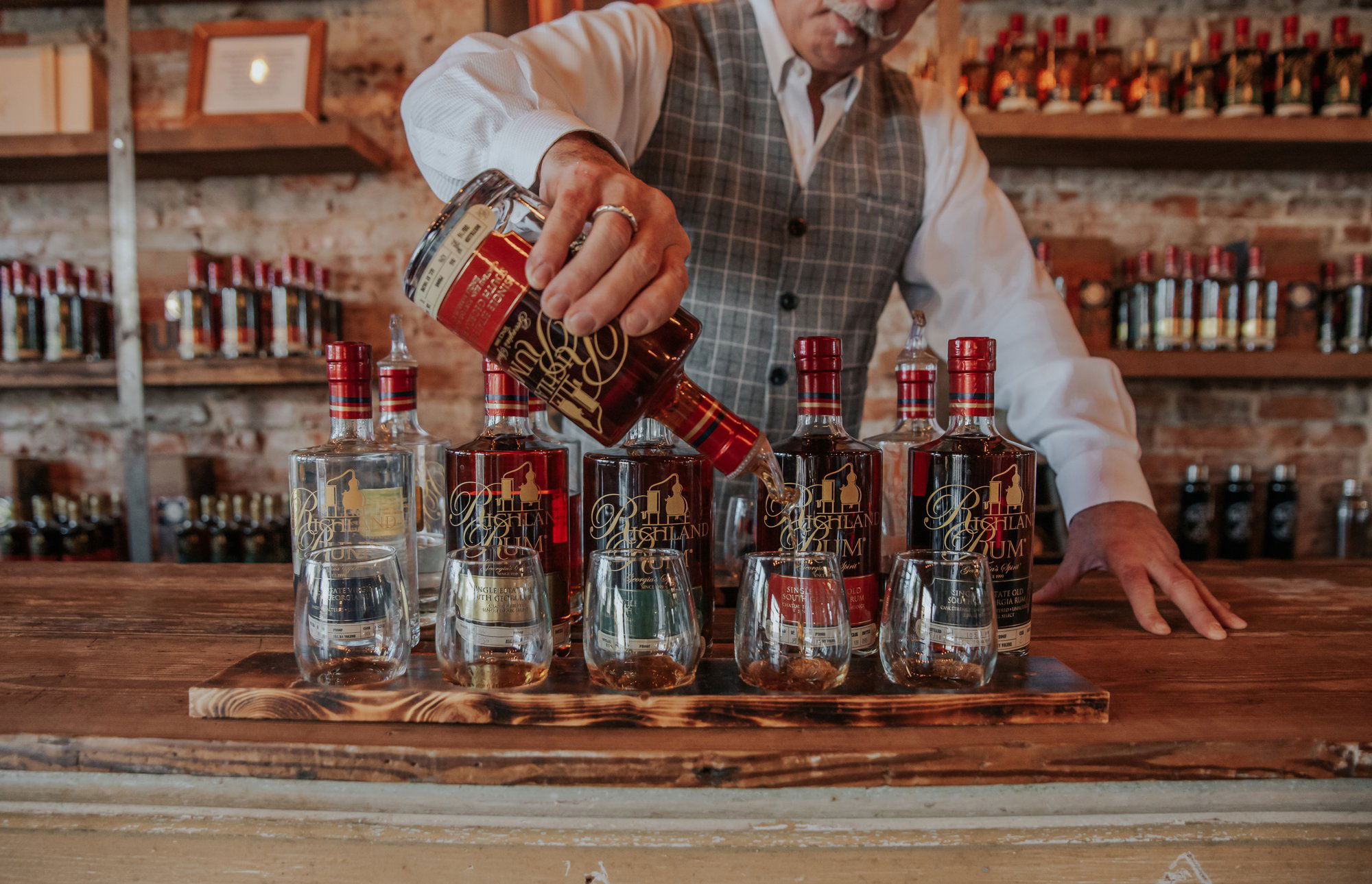 Bartender pouring a flight of Richland Rum