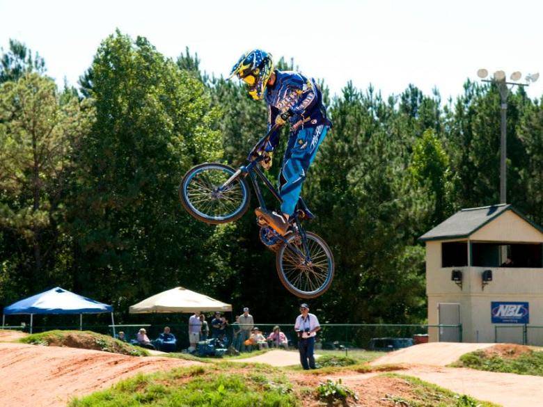 BMX rider jumping a hill at Sandy Ridge Park in McDonough, Georgia