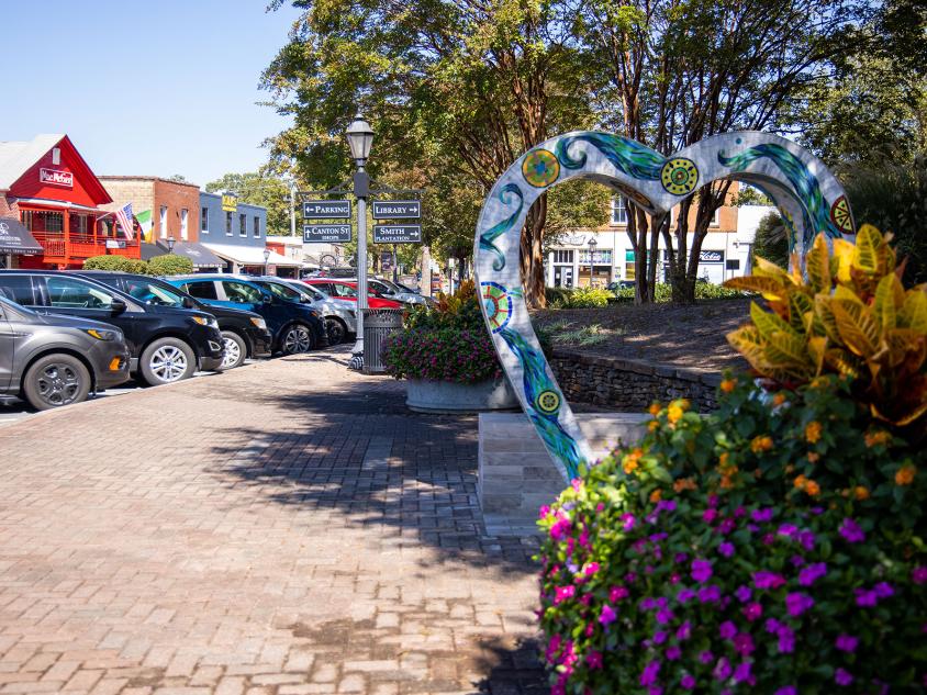 Public art lines a brick lane in Downtown Roswell, Georgia. Photo by @benjamingalland