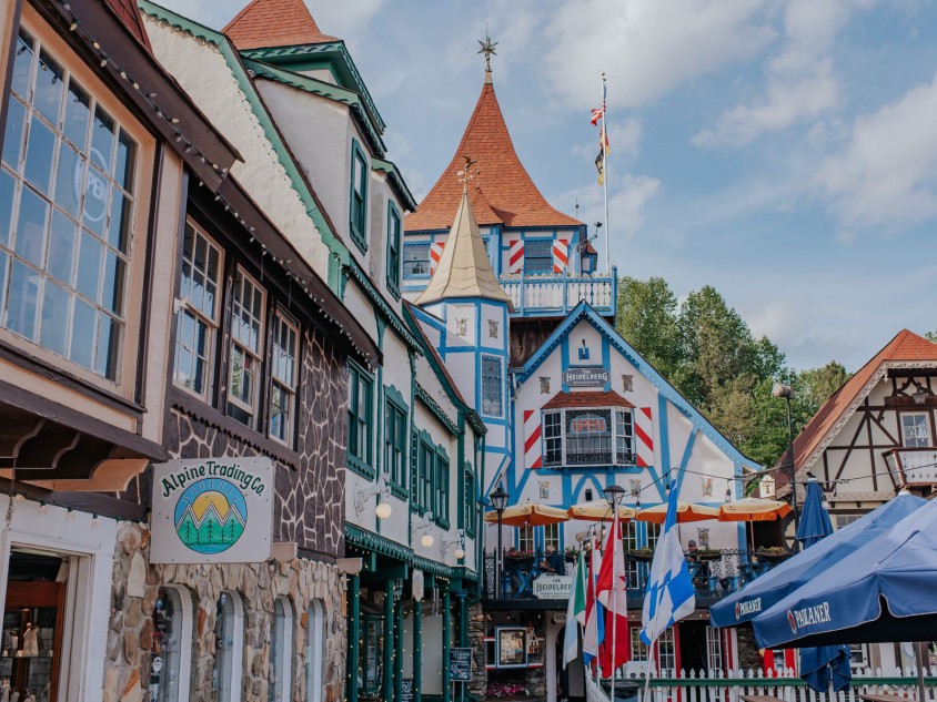 Colorful shops line the streets in a German-themed town in Georgia