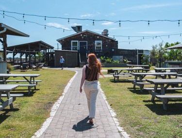 Woman at The Wyld in Savannah, Georgia. Photo by @wandernorthga