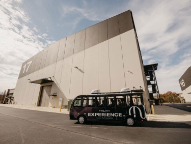 tour bus outside a sound stage at Trilith Studios in Fayetteville, Georgia