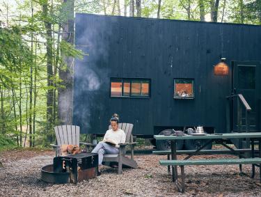 Reading outside a Getaway House in Suches, Georgia