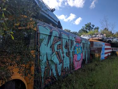 The School Bus Graveyard is located off Hwy. 23 in Alto, Georgia