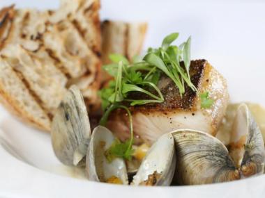 Cobia and clams at Southern Art Bourbon Bar in Atlanta, Georgia