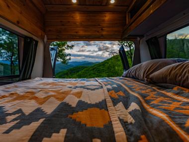 Live More Campervan interior at sunrise