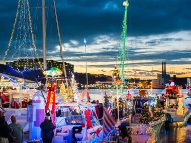 Boats decorated in holiday lights for the Christmas Boat Parade in Savannah, Georgia. Photo by Geoff L. Johnson