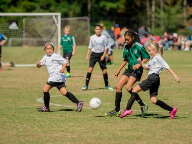 Girls playing soccer in Gwinnett County, Georgia
