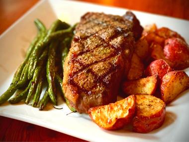 Steak, potatoes and asparagus at Blue Sky Grill in Moultrie, Georgia