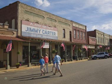 Family crossing street in Plains, Georgia