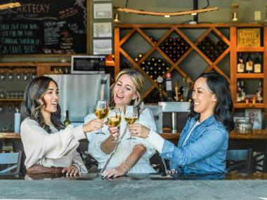Three women drinking wine in Ellijay, Georgia
