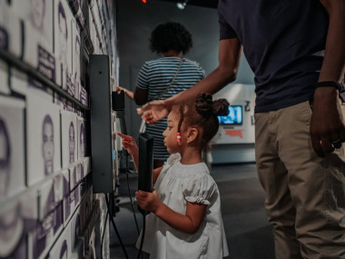 Small girl and father at National Center for Civil and Human Rights in Atlanta, Georgia