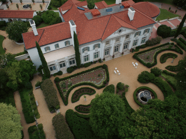 Aerial view of Hills & Dales Estate surrounded with lush greenery.