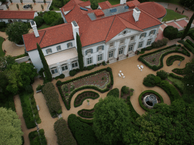 Aerial view of Hills & Dales Estate surrounded with lush greenery.