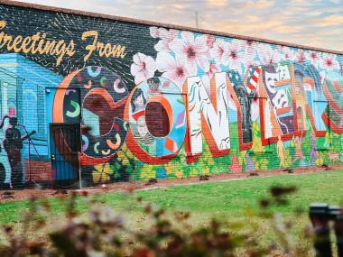 Colorful Greetings from Conyers mural in Olde Town Conyers