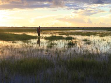 Clint McNeal fishing in the Georgia salt marsh at sunset