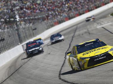 Matt Kenseth (20) battles for position during the Folds of Honor QuikTrip 500 at the Atlanta Motor Speedway in Hampton, Georgia, Feb. 28, 2016.