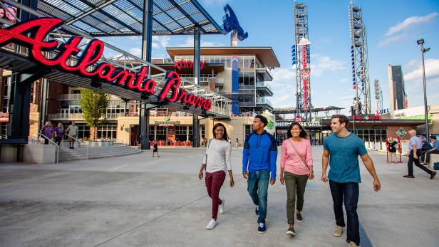 Four friends at Truist Park, home of the Atlanta Braves