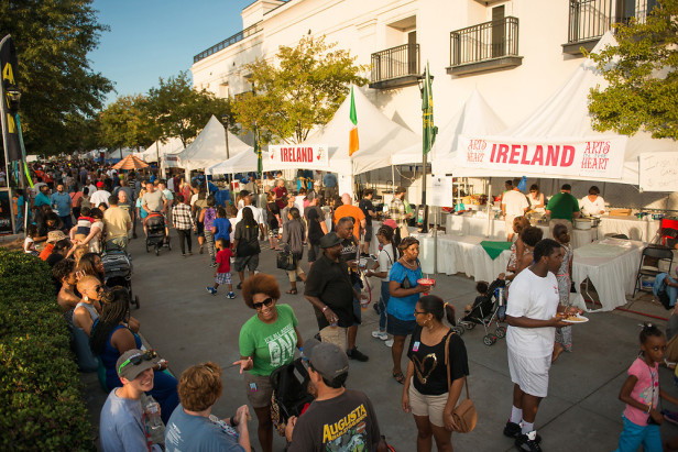 Festival-goers and tents at the Arts in the Heart of Augusta Festival