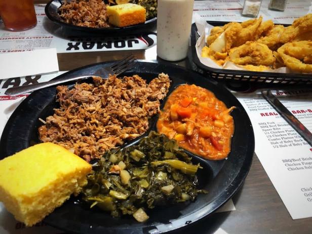 Barbecue and various side dishes at a restaurant