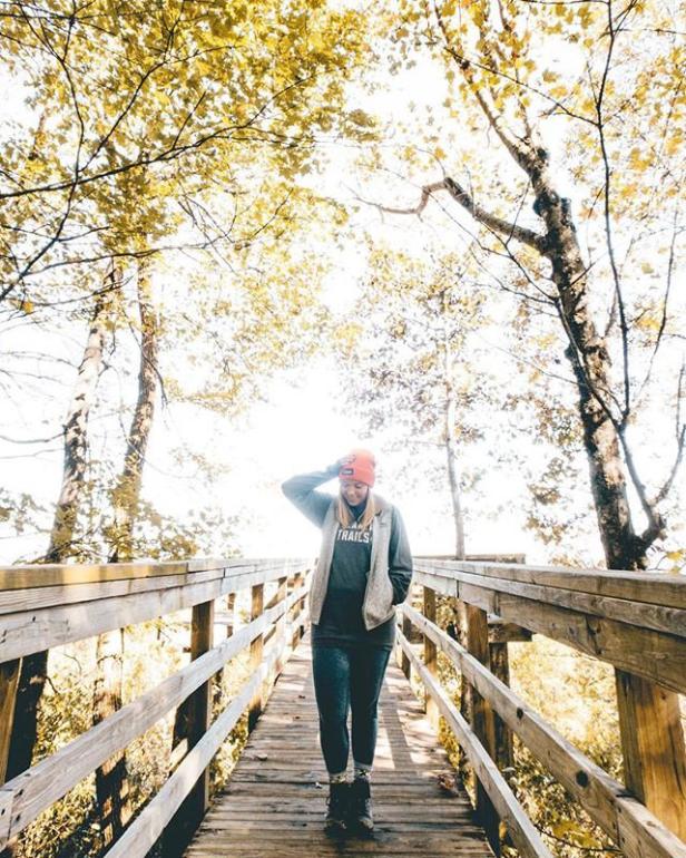 Woman hiking at Black Rock Mountain State Park in Mountain City, Georgia.
