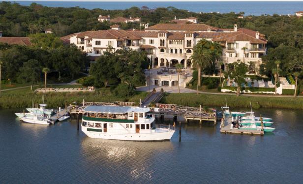 Boats docked at a luxury waterfront resort.