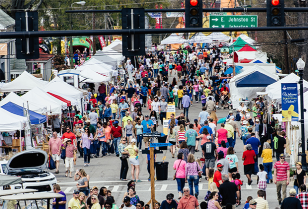 aerial view of the street during a festival filled with people