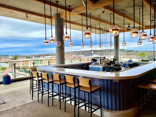View of bar at Eighteen85 Rooftop Bar at Hotel Indigo in Columbus, Georgia