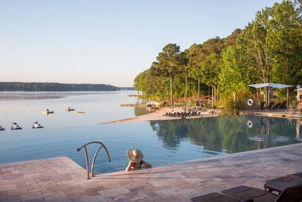 Woman in the infinity pool at The Ritz-Carlton Reynolds, Lake Oconee in Greensboro, Georgia. Photo by @visitlakeoconeega