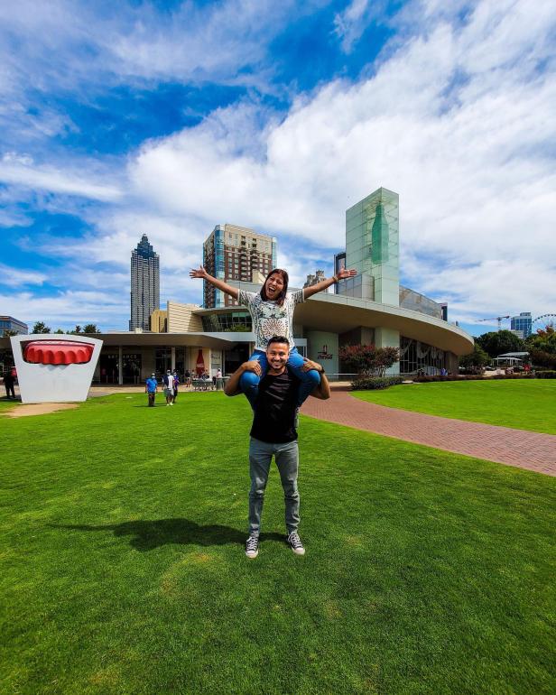 Couple at World of Coca-Cola in Atlanta. Photo by @jr.views