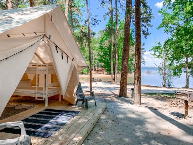 Glamping tent with lake in the background
