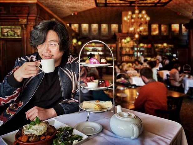 Man drinking tea at The Gryphon Tea Room in Savannah