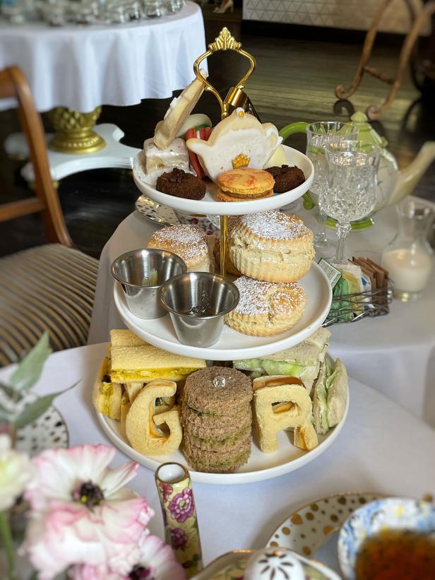 Three-tiered tray of treats at The Ginger Room in Alpharetta, Georgia. Photo by Angela Renals, @destination_tea