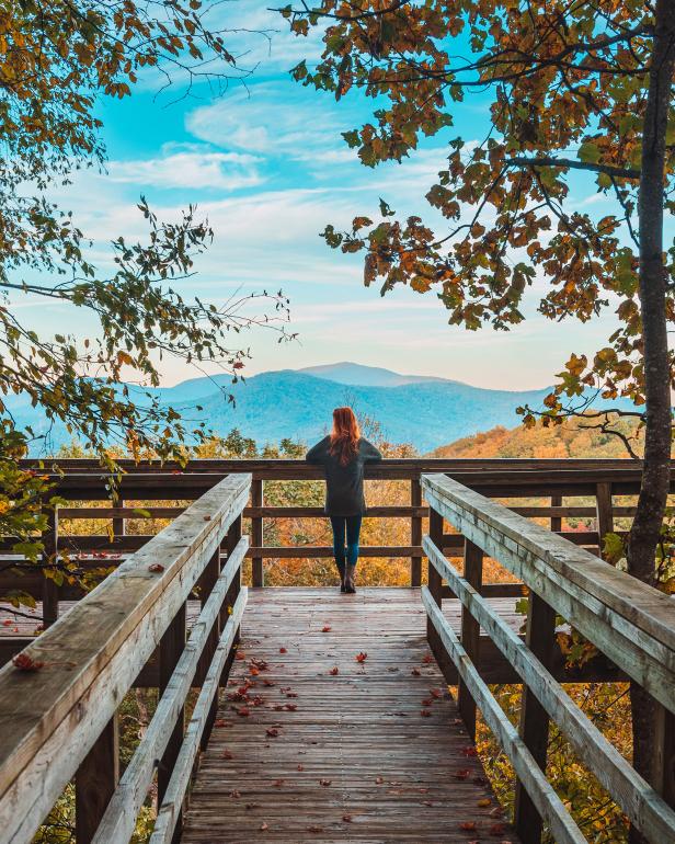 Woman at overlook at Black Rock Mountain State Park in Mountain City, Georgia
