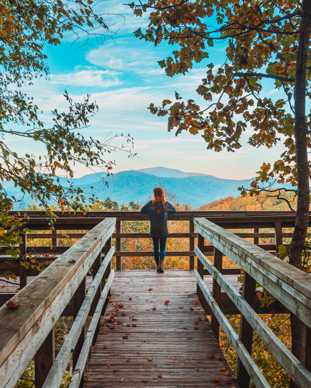 Woman at overlook at Black Rock Mountain State Park in Mountain City, Georgia