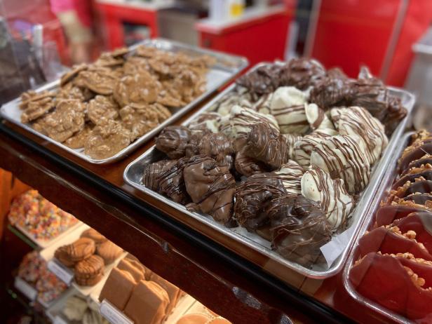 Trays of sweet pralines in a display case