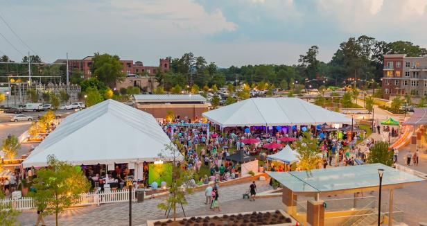Outdoor event tents and people in Sandy Springs
