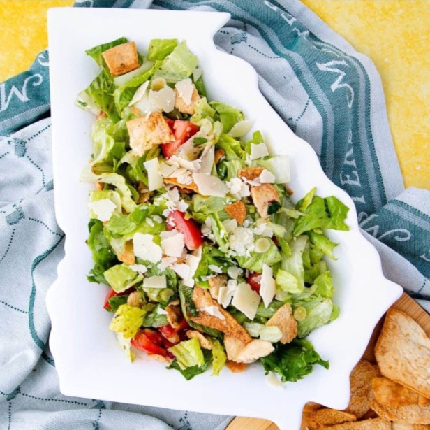Green Jacket salad on a white Georgia-shaped plate at Becks in Augusta, Georgia